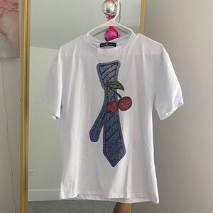 White T-Shirt with Blue Tie and Cherry Design